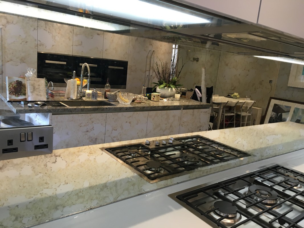Mirror glass splashback in West Brompton luxury kitchen