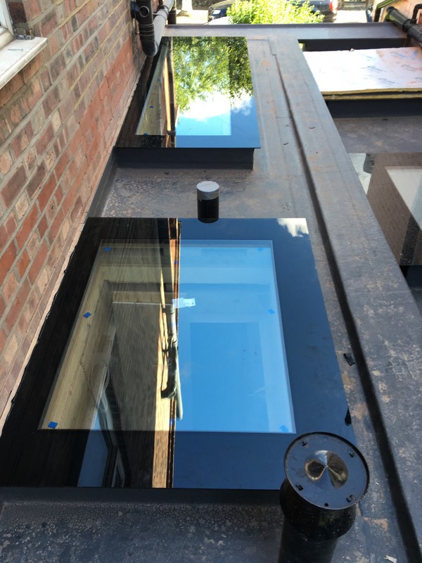 Multiple flat roof skylights on extension in West Brompton